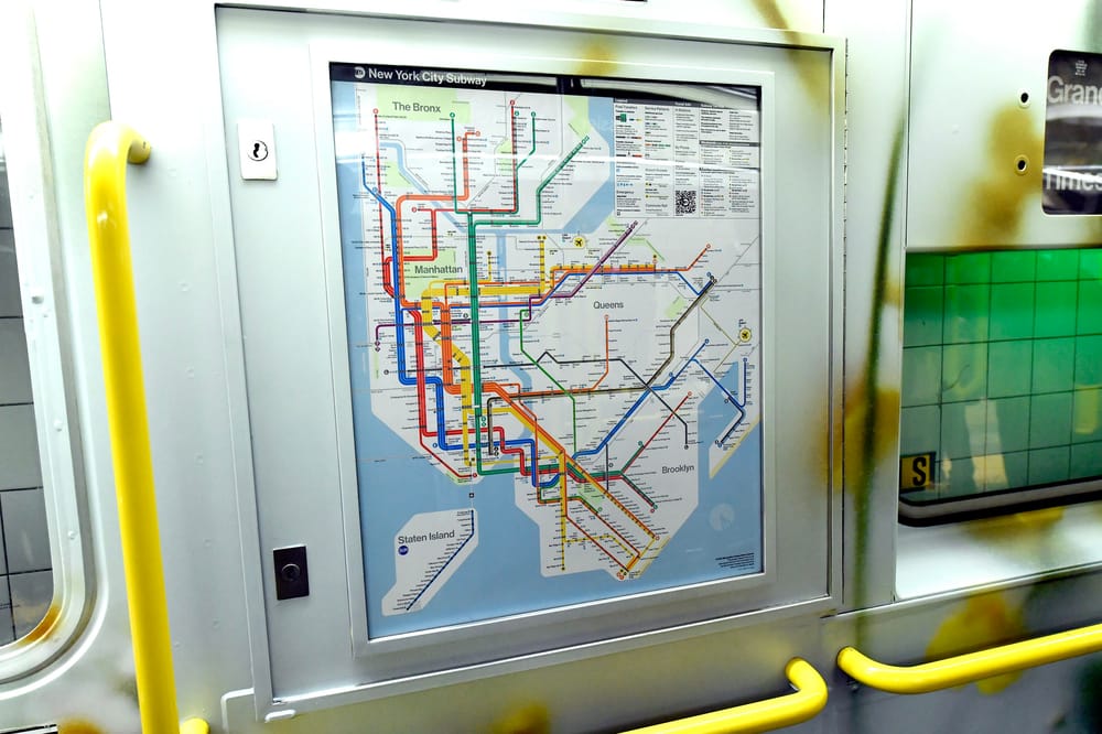 Diagrammatic subway map inside a subway car