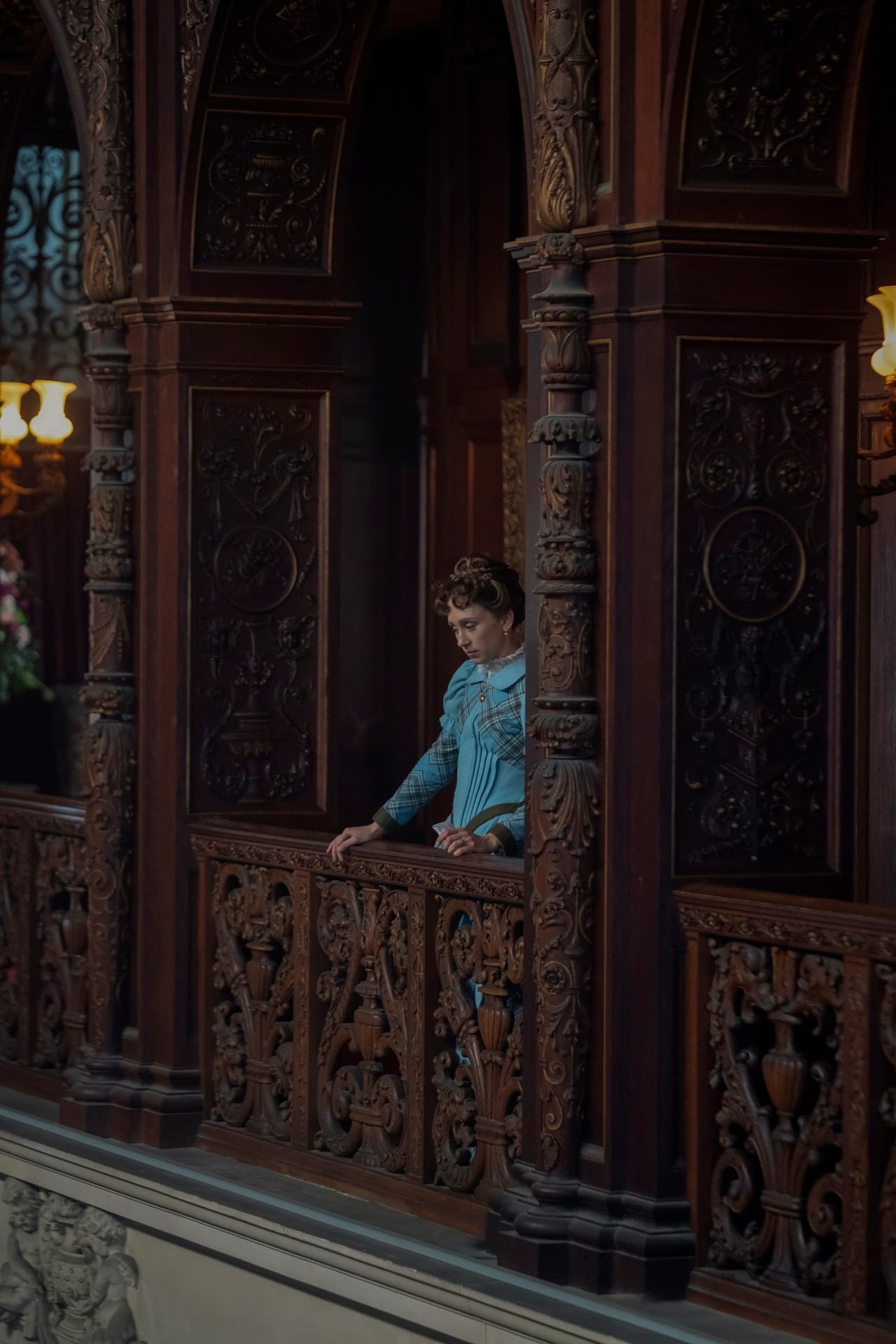 Taissa Farmiga at a balcony in Ochre Court