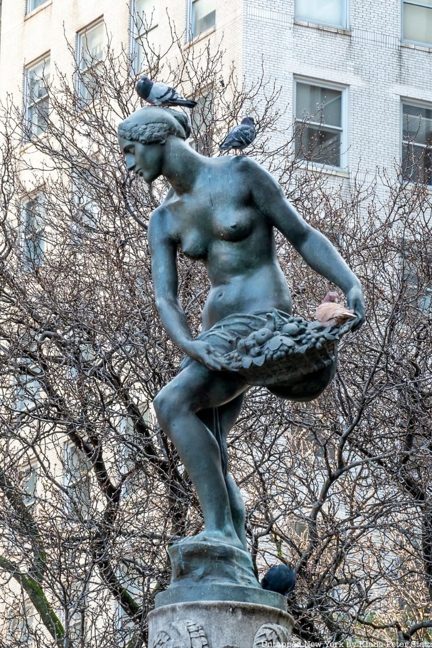 Figure atop the Pulitzer Fountain outside Central Park