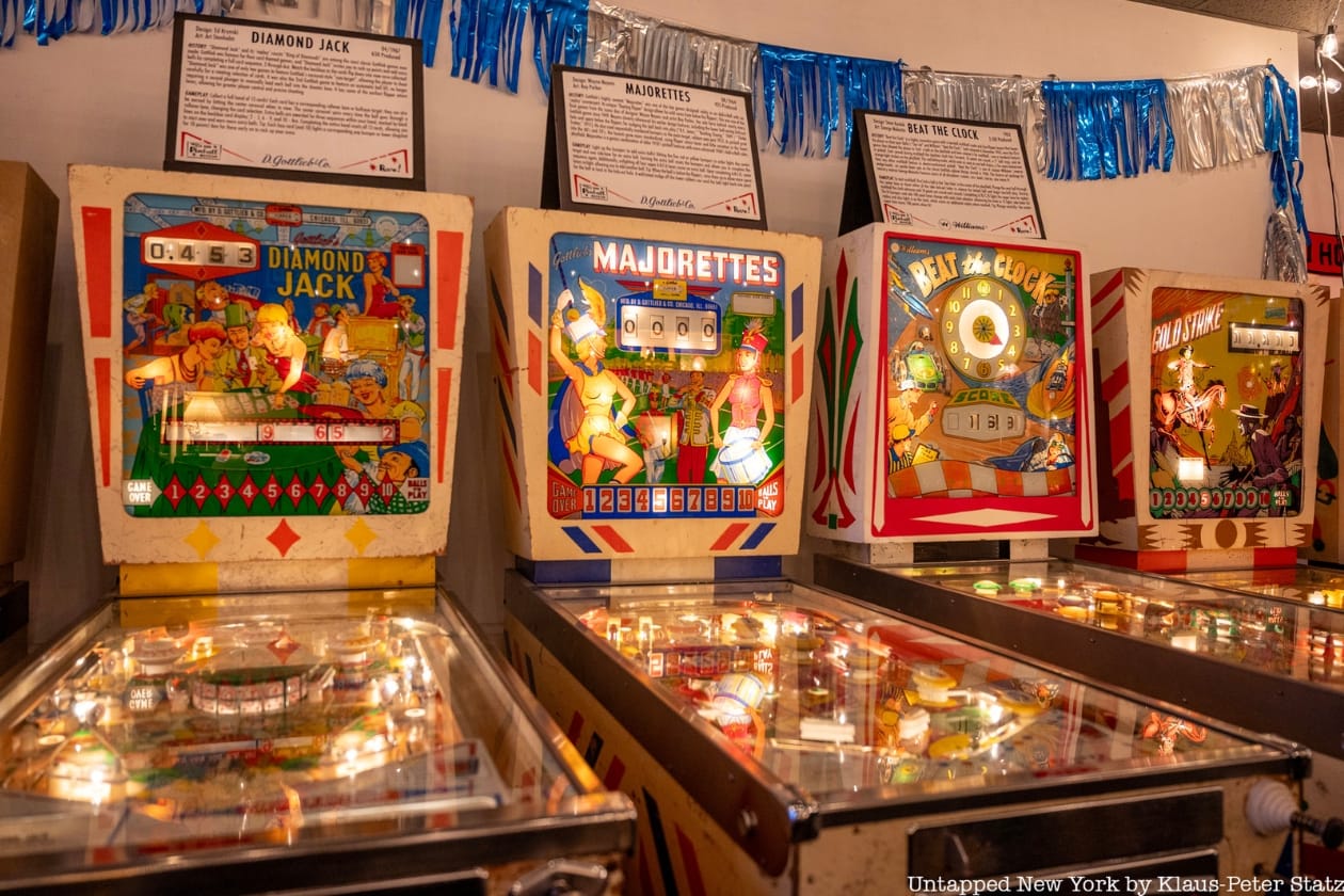 A row of pinball machines at the Red Hook Pinball Museum