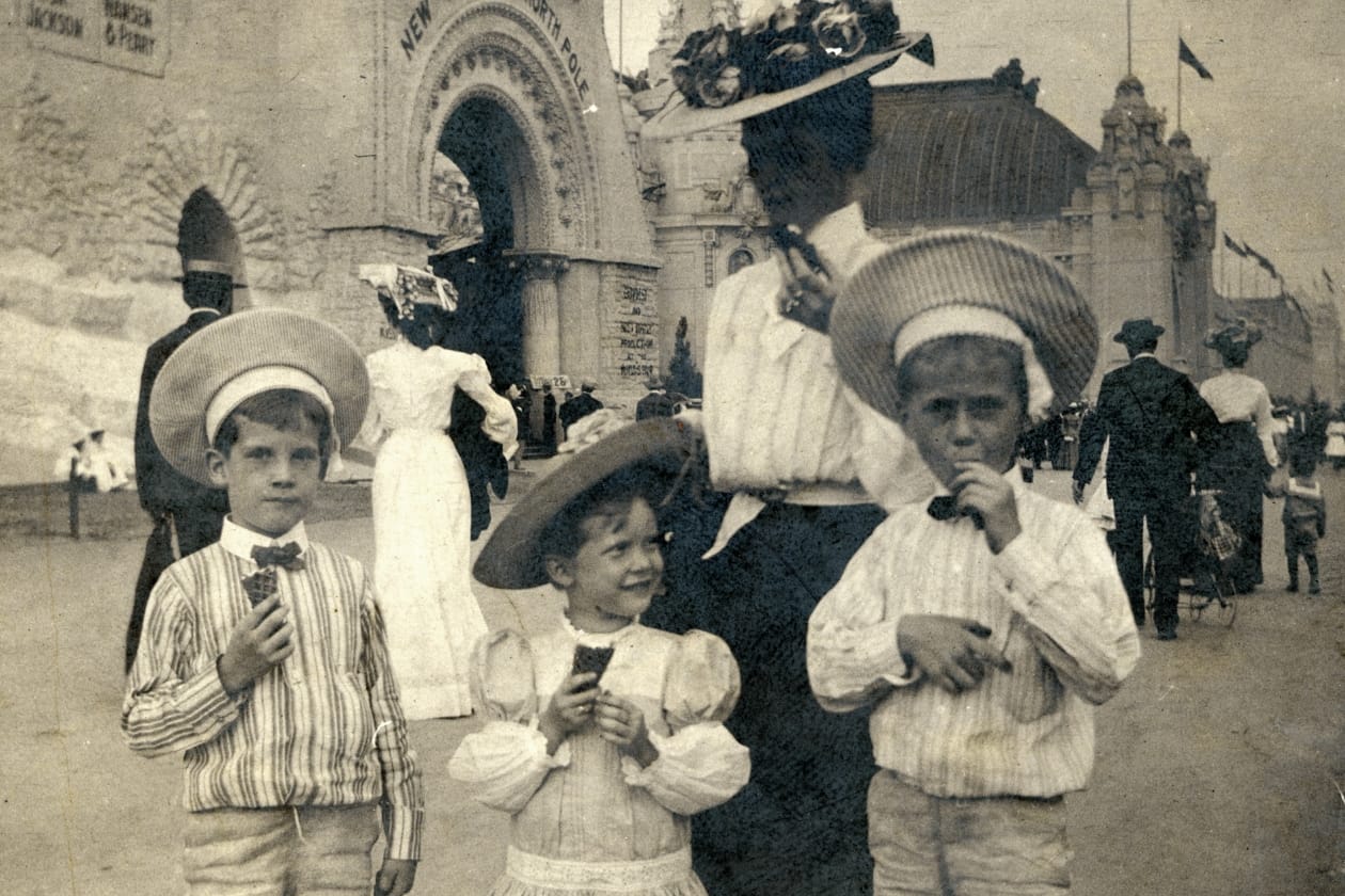 Randolph Smith Lyon, Mildred Frances Lyon, Mrs. Montague Lyon (Frances Robnett Smith Lyon), Montague Lyon, Jr., eating ice cream cones at the 1904 World's Fair