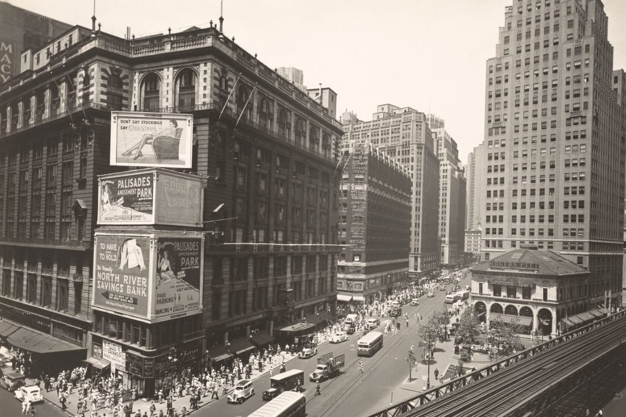 Macy's holdout building covered in advertisements in 1936