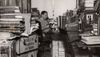 Harry Houdini in his library