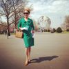 Woman posting in front of Unisphere