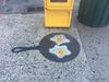 Street Art of the Day: Manhole Cover Becomes Frying Pan with Sizzling Eggs in Alphabet City