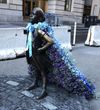 Fearless Girl Gets Draped in a Flower Cape for International Women’s Day