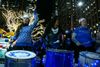 Festive drummers march through the streets of NYC