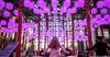 Purple glowing cubes float above the lobby of Brookfield Place in a winter public art installation.