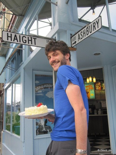 Asexual David Jay at the corner of Haight and Ashbury Asexual David Jay at the corner of Haight and Ashbury with a slice of cake with white frosting and a little strawberry on top, symbolizing celebration, the asexual community’s answer to the LGBT rainbow.