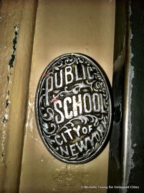 The letters of the door knob look like a Sans Serif condensed font. 