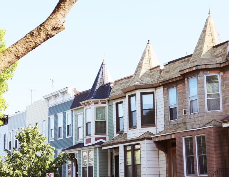 Houses in Windsor Terrace covered in varying materials. 