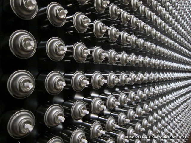 Wall of spray cans.
