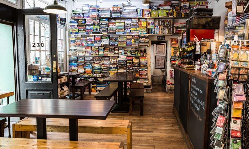 Stacks of board games line the walls at The Uncommons