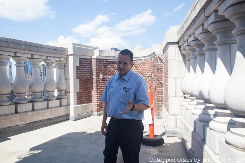 Sonny Atis, outside the 21st penthouse floor next to the balustrades