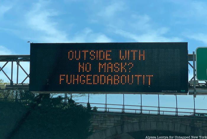 Outside with No Mask fuhgeddaboudit sign
