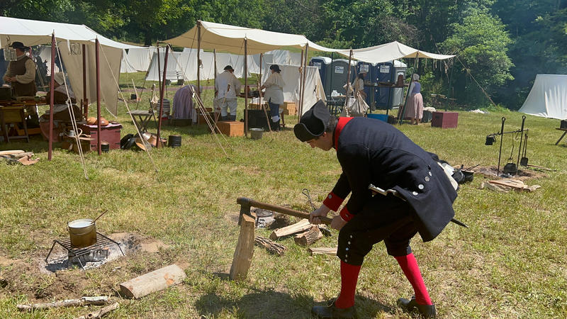 AJ Jacobs chopping wood