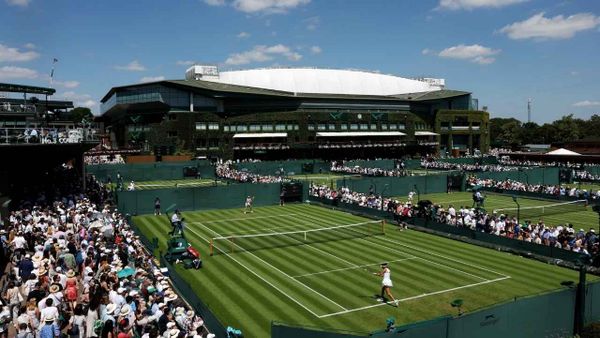Tennis fans watch Wimbledon 2025 matches on the grass courts of London’s All England Club