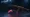 Karambit Fade knife with a gold-to-magenta gradient blade next to an AK-47 Redline rifle, representing the ways to get CS2 skins