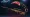 Faca Karambit Fade com lâmina em degradê de laranja a rosa e roxo, ao lado de uma AWP Dragon Lore, skins que simbolizam o alvo de um upgrade de CS2.