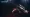 AK-47 Redline and AWP Asiimov rifles crossed with a Karambit Fade knife, three iconic Counter-Strike skins that carried over from CS:GO to CS2.