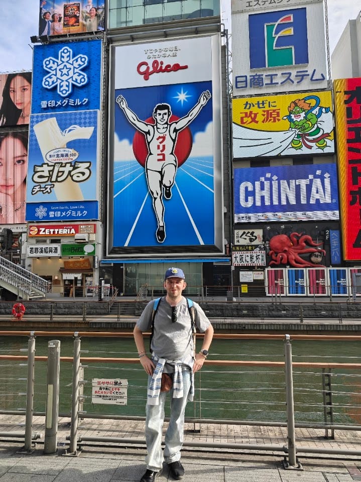 A photo of me taken at Dotonbori, Osaka, Japan, April 2026