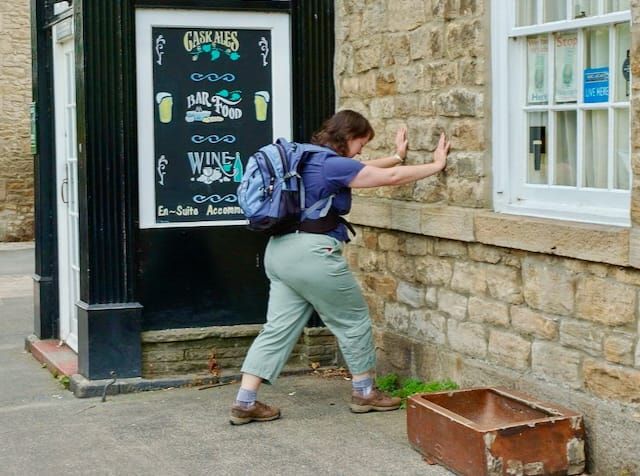 Me stretching before a hike along Hadrian's Wall