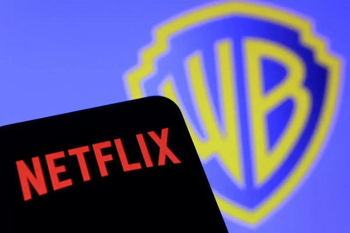 Netflix logo and Warner Bros. Discovery headquarters symbolizing $72B all-cash media deal