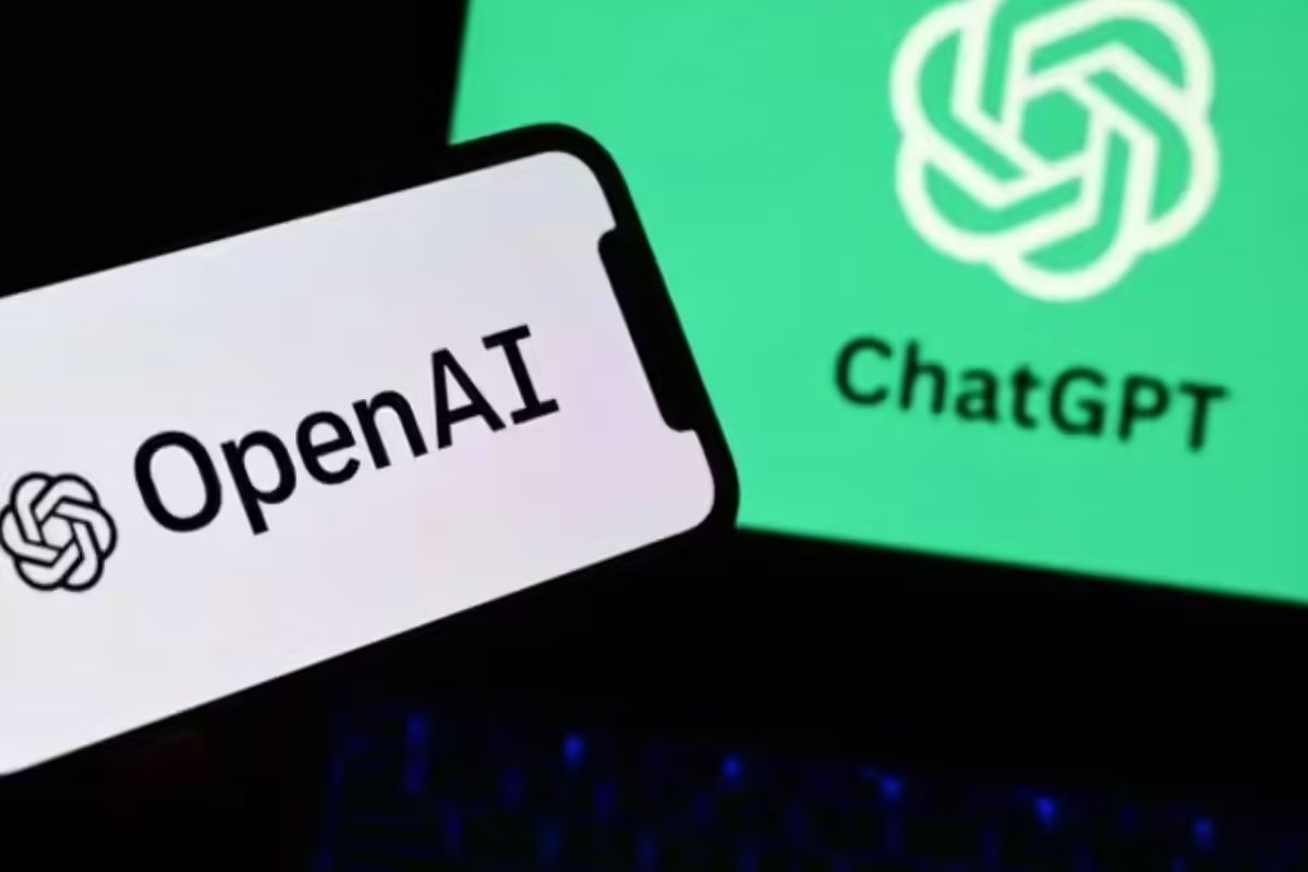 OpenAI logo displayed on a smartphone screen with AI code visible in the background.
