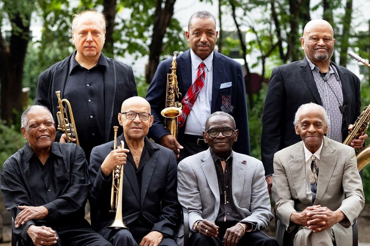 The Cookers jazz band pose together ahead of their canceled New Year’s Eve performance.
