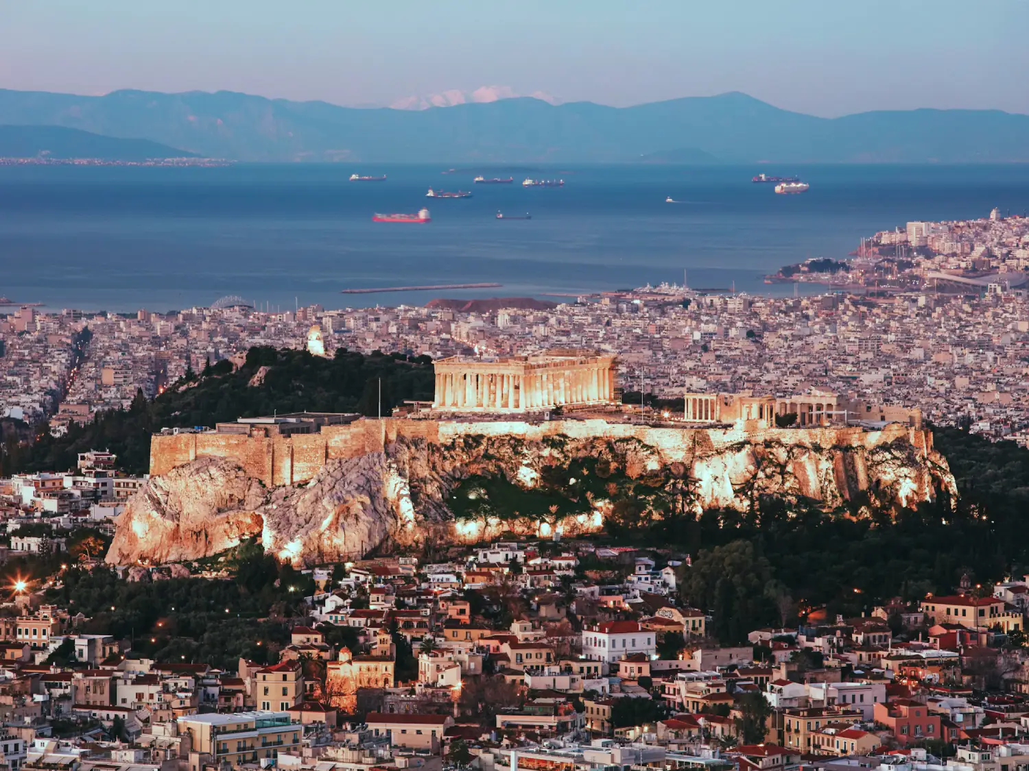 Cityscape of Athens with illuminated Acropolis Hill, Greece.