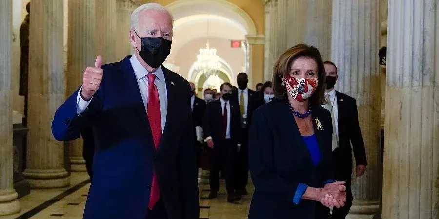 President Joe Biden of the United States and Nancy Pelosi