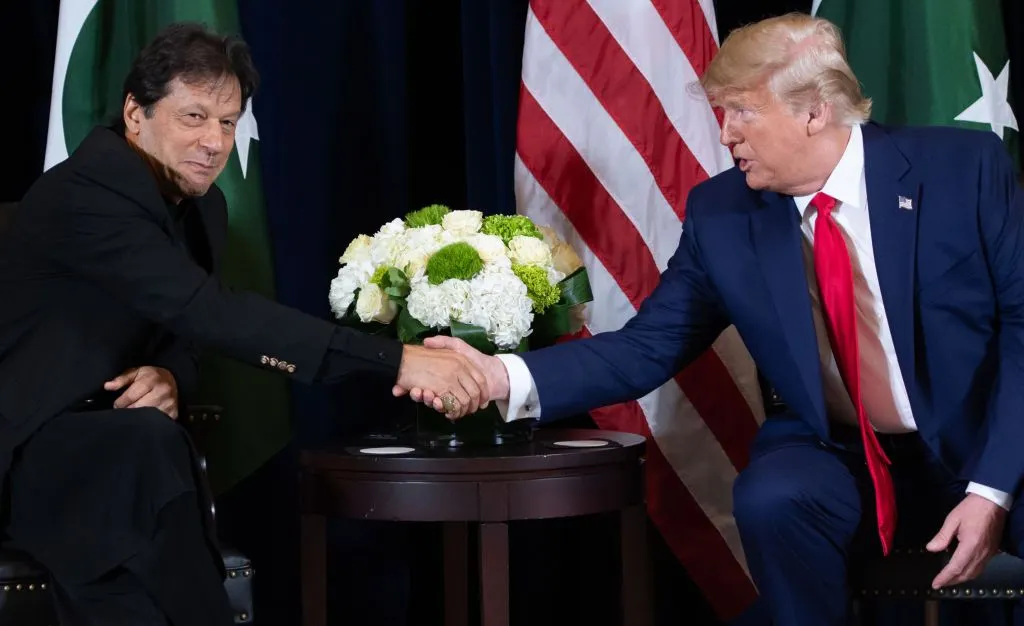 Image of former U.S. President Donald Trump shaking hands with former Prime Minister of Pakistan Imran Khan