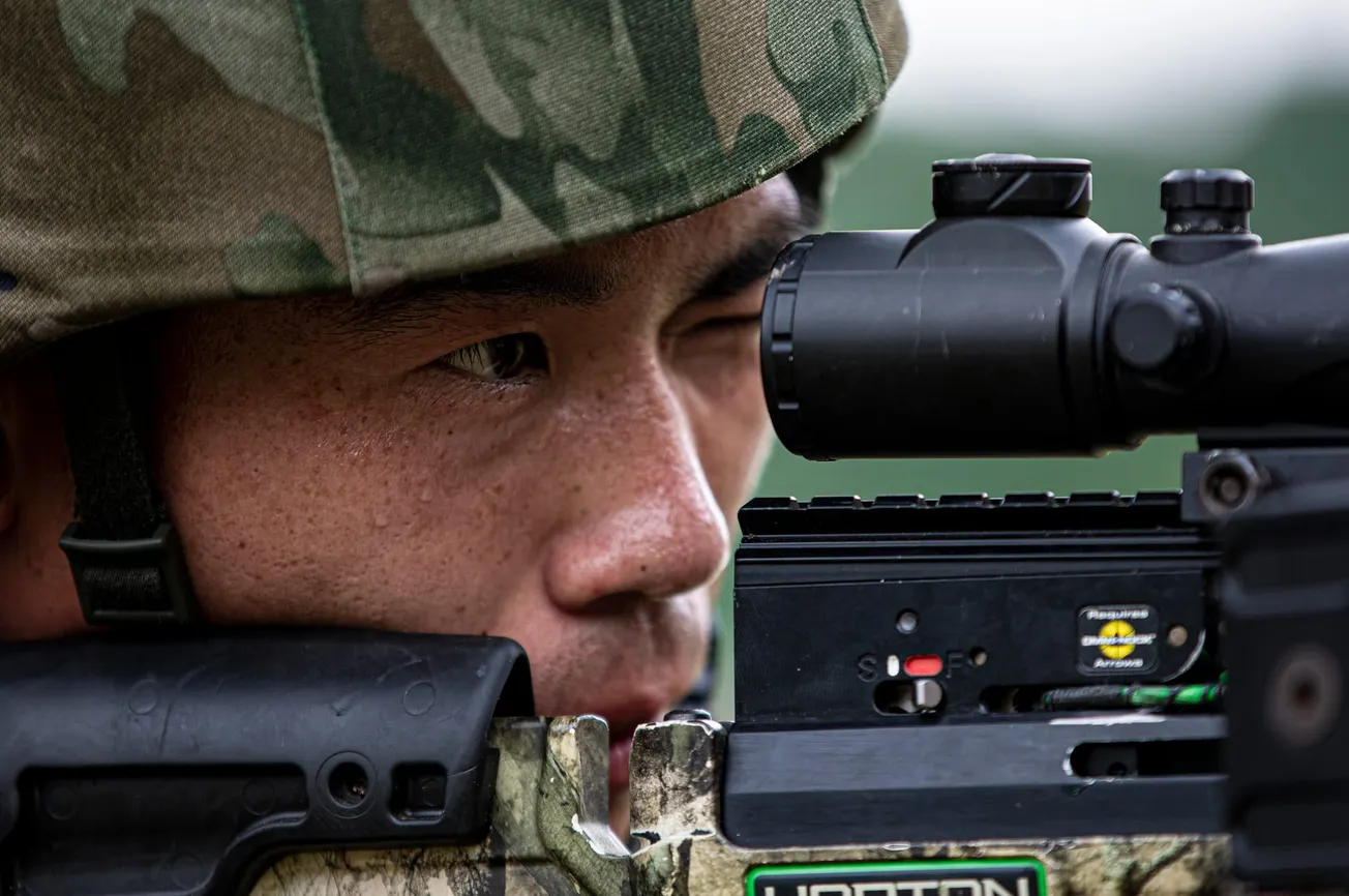 Xi's Dual Strategy Of Purging Corruption And Powering Up Military