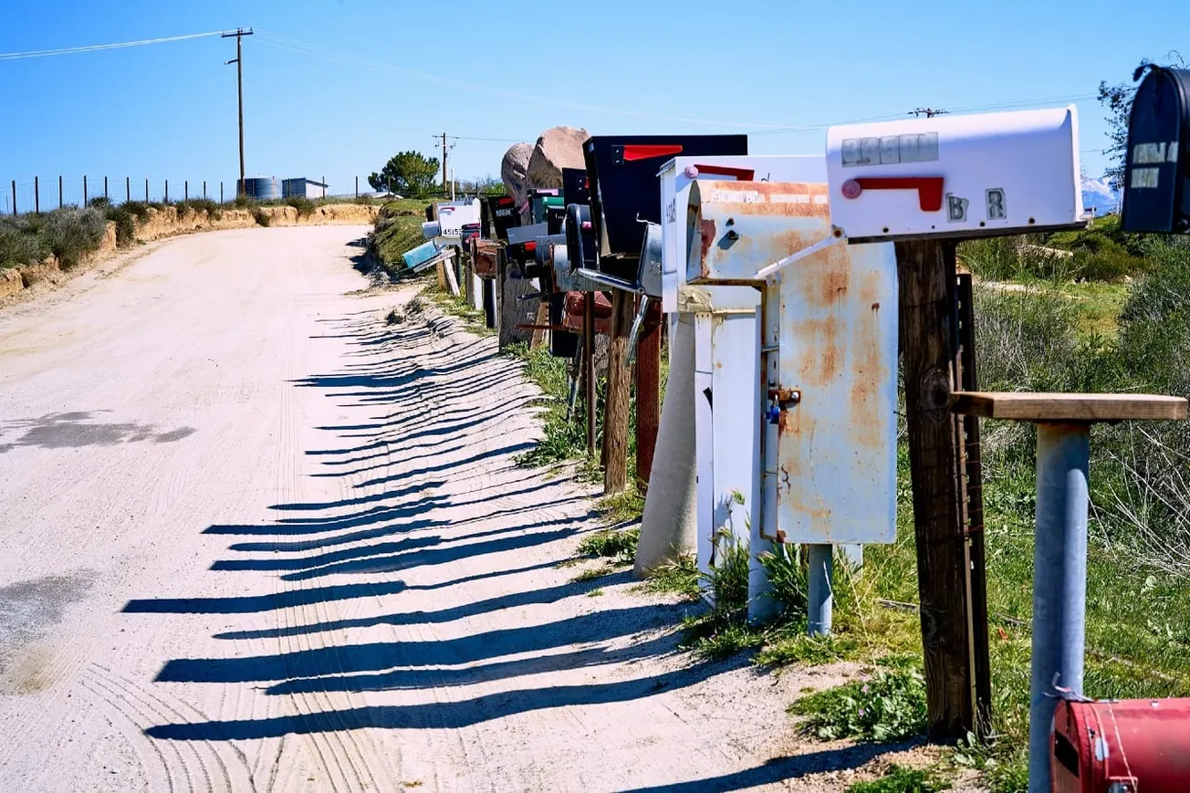 Trump’s Tariff Shift Forces Postal Services To Halt Shipments To America