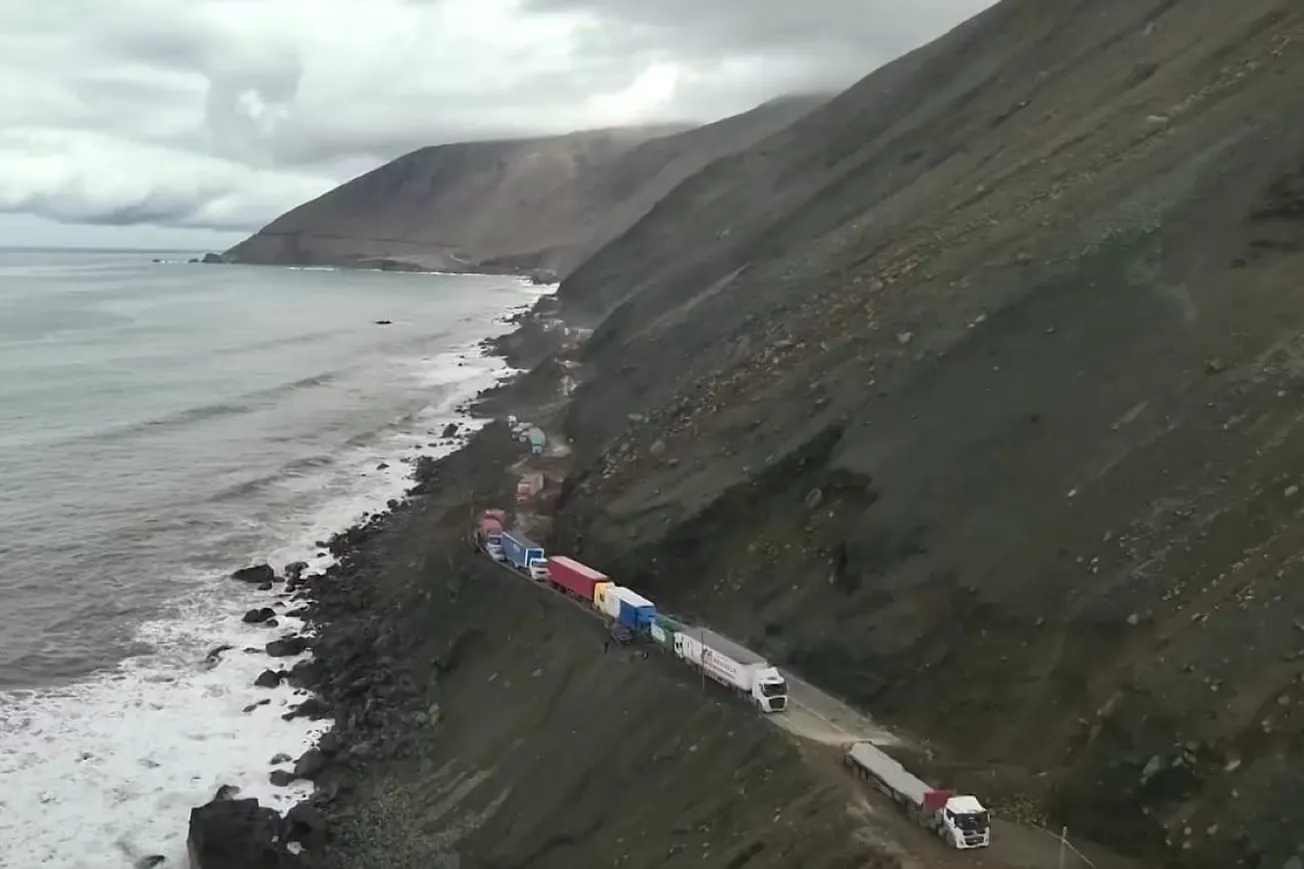 Watch: Cargo Trucks Stranded On Peru Coastal Highway Due To Landslides