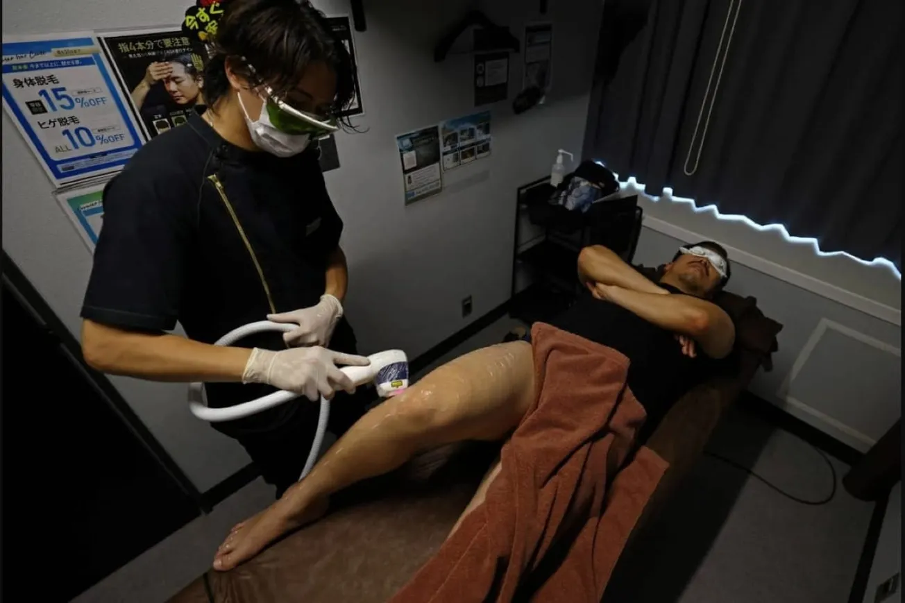 Watch: Japanese Men Shave Hair To Deal With Summer Heat