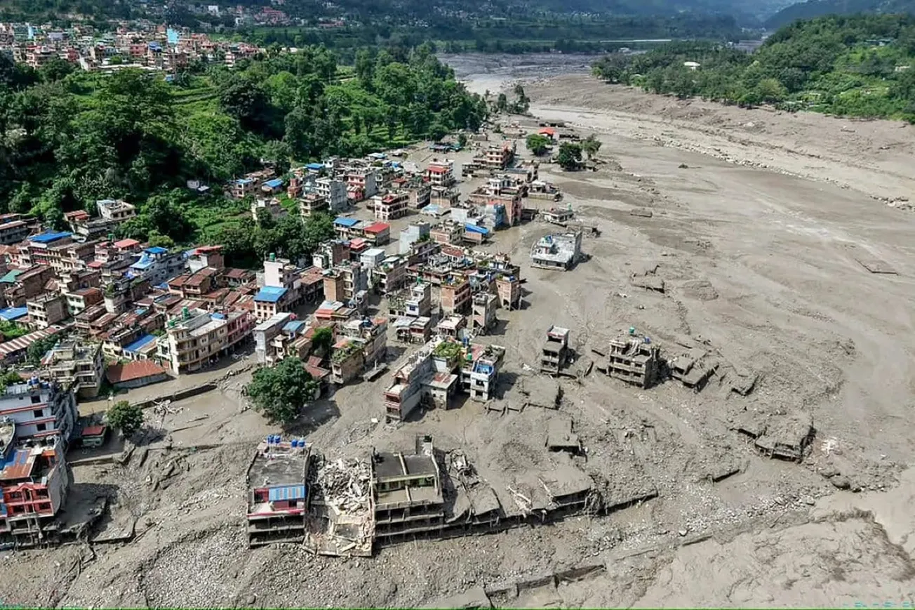 Watch: Authorities Begin Temporary Burials For Nepal Flood Victims