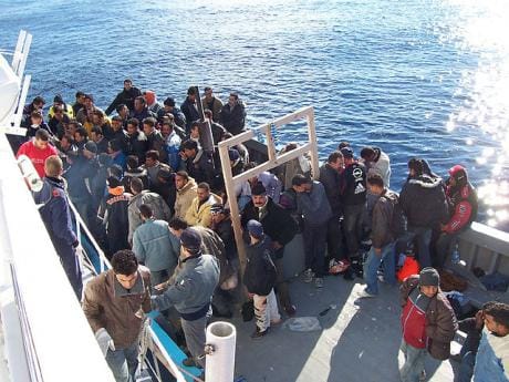 640px-Boat_People_at_Sicily_in_the_Mediterranean_Sea_0.jpg