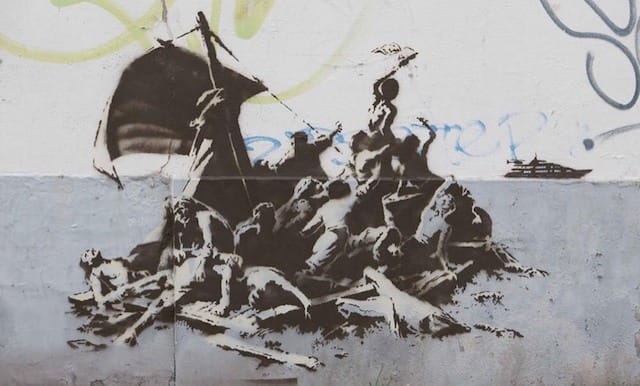 Banksy-We-re-not-all-in-the-same-boat-Calais-2015.jpg