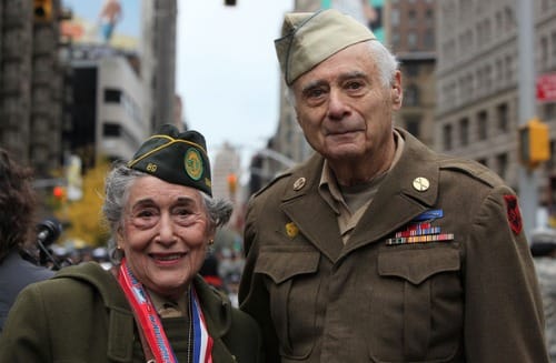 World War II veterans Margie Zwick, Women's Army Corps, and Arnold Strauch, U.S. Army, look on before the annual Veterans Day parade November 11, 2009 in New York City.  Mario Tama/Getty Images North America.