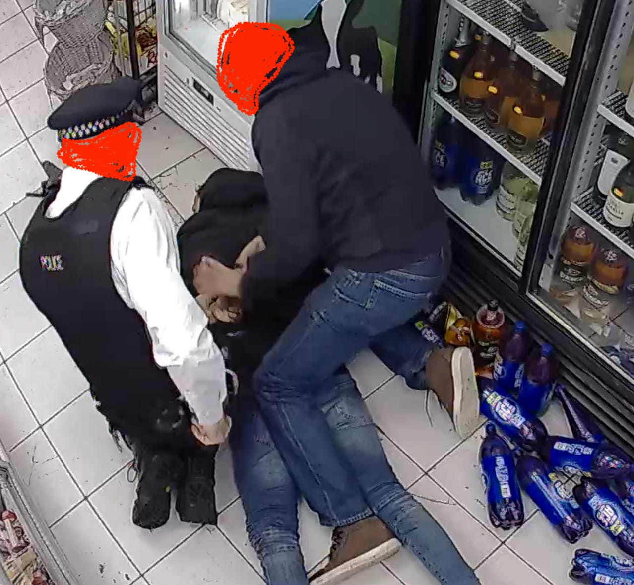 Officer and helper handcuff Rashan