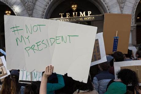 Not_My_President,_Protesters_outside_Trump_Hotel_on_Pennsylvania_Ave,_DC_(30603012530)_0.jpg