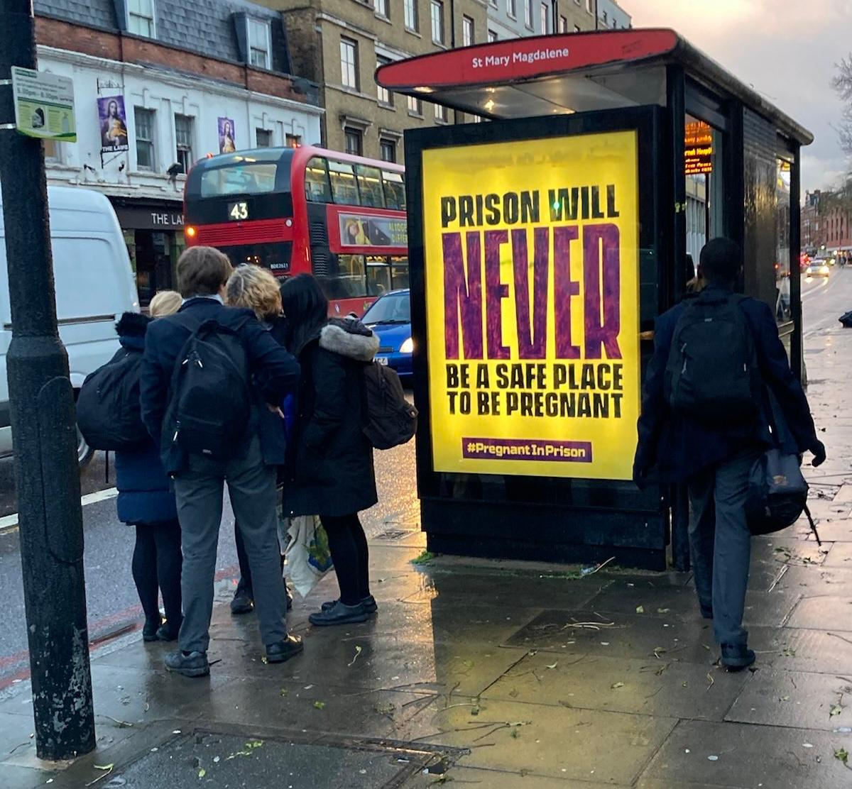 Pregnancy in prison bus shelter.png