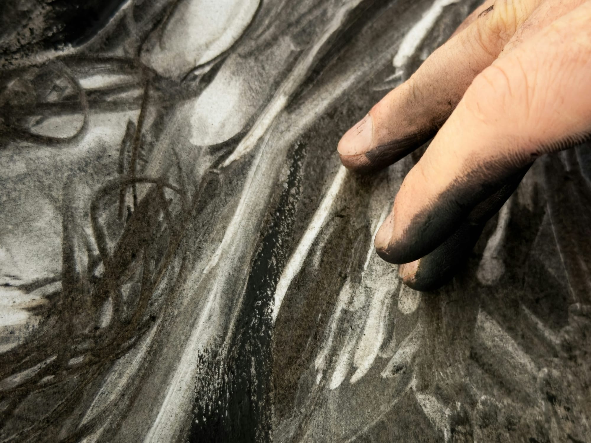 A hand drawing in the ash