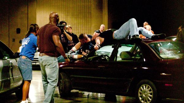A Heel John Cena Meets Eddie Guerrero in a Parking Lot Brawl