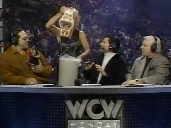 Madusa dumps the WWF Women's Championship in a garbage can.