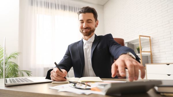 Guy busy with tax returns