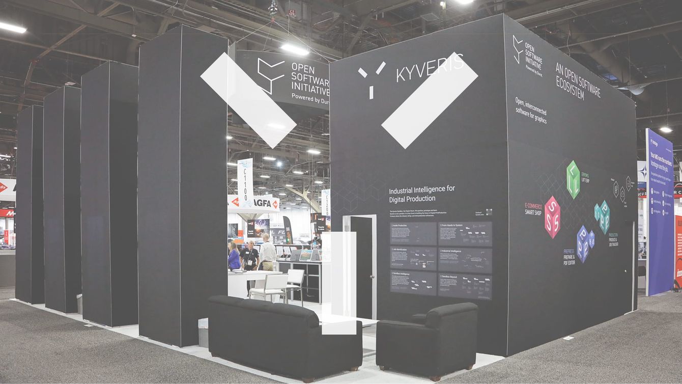 The Durst stand at PRINTING United Expo 2026 with Kyveris and Open Software Initiative walls.