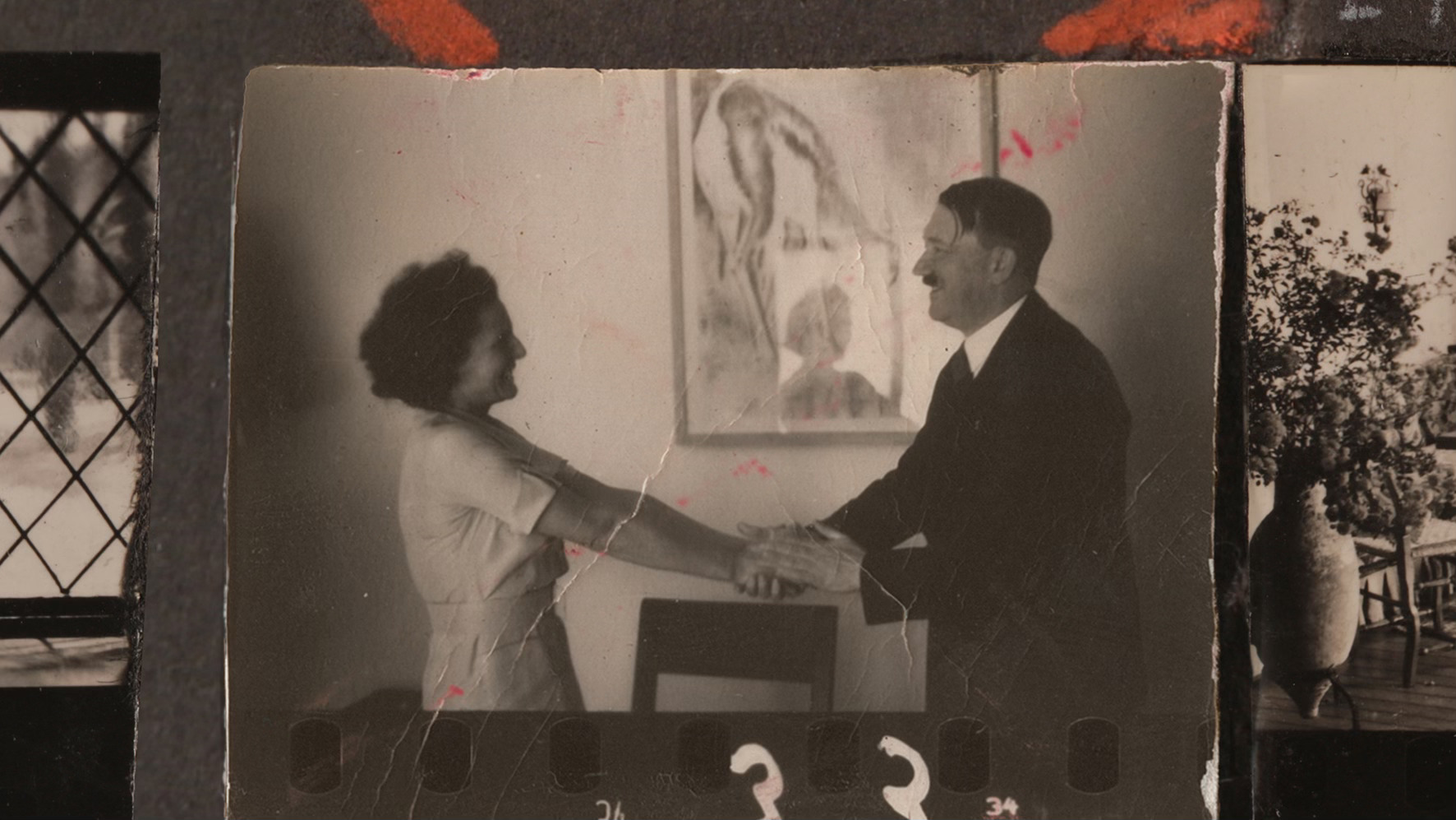 A photo of Leni Riefenstahl shaking hands with Adolf Hitler in Riefenstahl