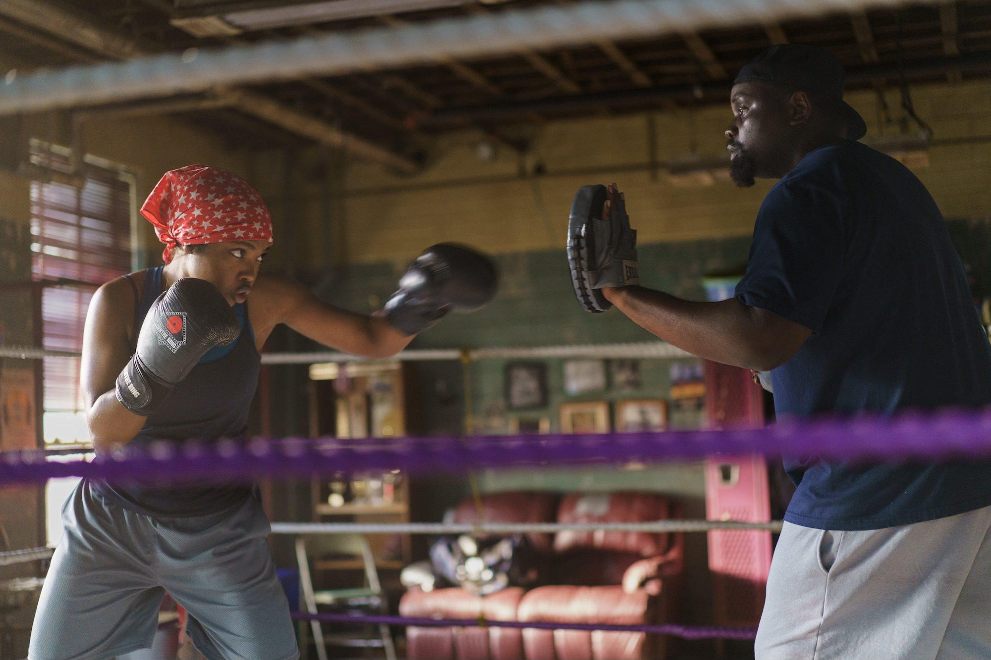 Ryan Destiny as Claressa Shields and Brian Tyree Henry as Jason Crutchfield in The Fire Inside